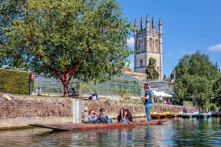 Punting from Magdalen Bridge Boathouse with Magdalen Tower behind