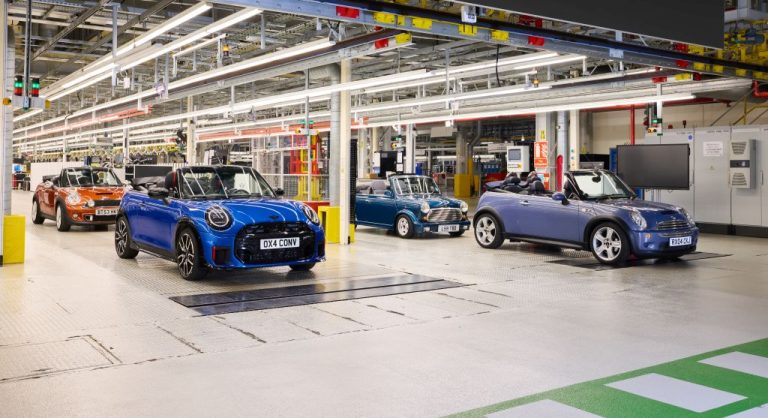 Classic and current Minis on the production floor at BMW Group Plant Oxford